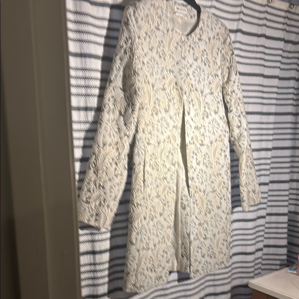 Cream Textured Blazer with High Collar and Structured Silhouette